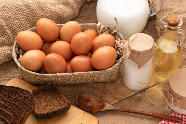 Homemade products, eggs, bread, milk and sour cream. Homemade products, eggs, bread, milk and sour cream. quail egg stock pictures, royalty-free photos & images