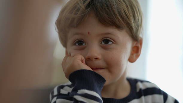 istock One pensive little boy thoughtful child portrait face 1383955938