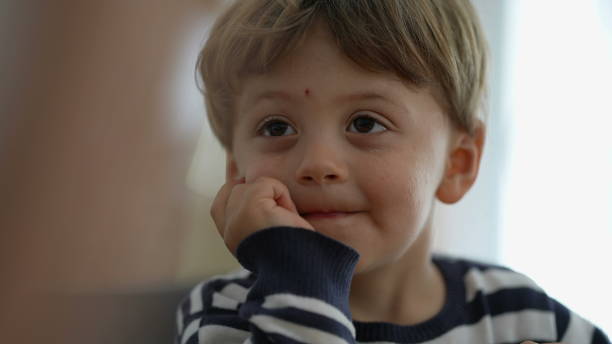 istock One pensive little boy thoughtful child portrait face 1383955977