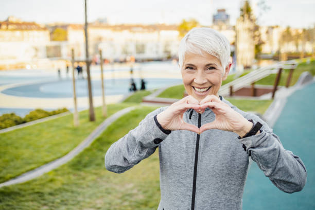 istock Smiling senior woman sharing love 1383960063