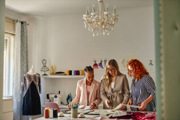 istock Fashion designers on a meeting in studio 1383960168