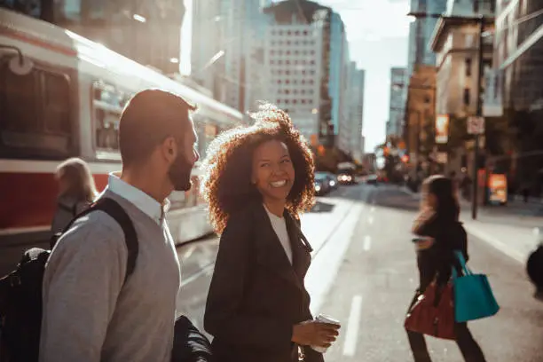 Photo of Two colleagues walking to the office