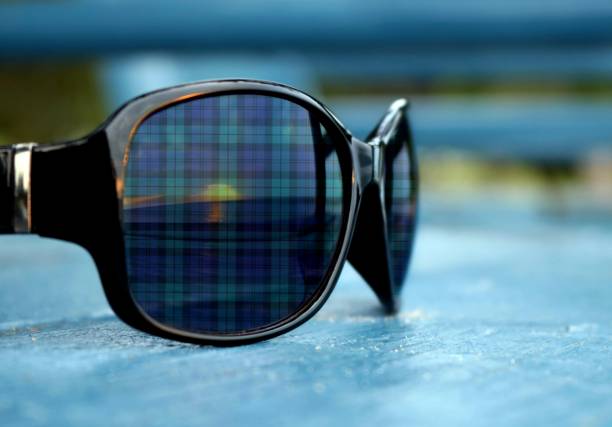 istock Gaelic tartan on sunglasses at sunset 1383965210