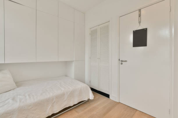 istock Bedroom in white tones in a modern house 1383969226