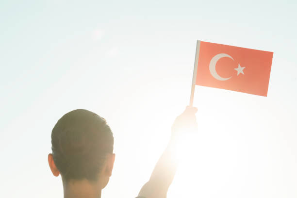 istock Woman with Flag 1383969300