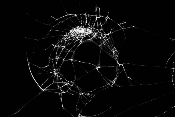 istock Broken cracks glass fracture effect texture isolated abstract black background 1383970854