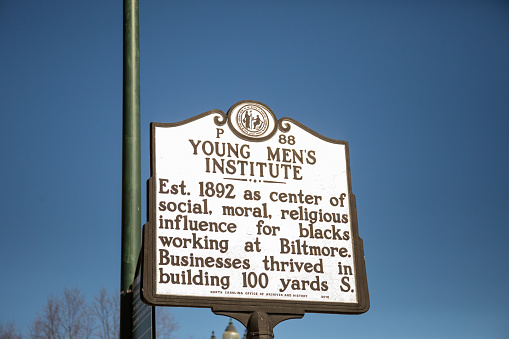 Sign commemorating Young Mens Institute in Asheville, North Carolina.