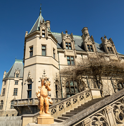 Asheville, North Carolina, USA - March 1, 2022 :Outside the iconic Biltmore Estate in Asheville, North Carolina from gardens.