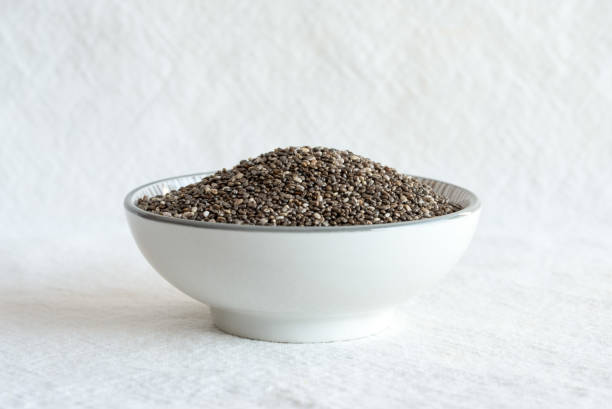 Black Chia Seeds in a Bowl stock photo