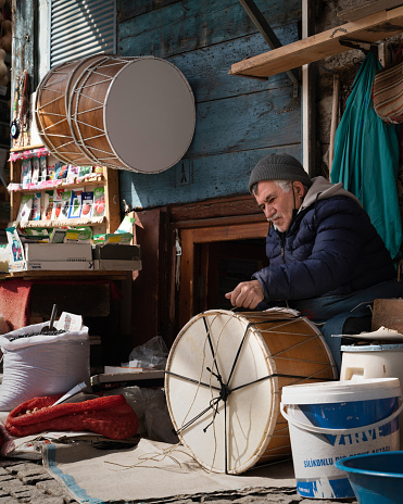 Ankara, Turkey - March 05 2022: A drum maker who manufactures and sells drums on the street