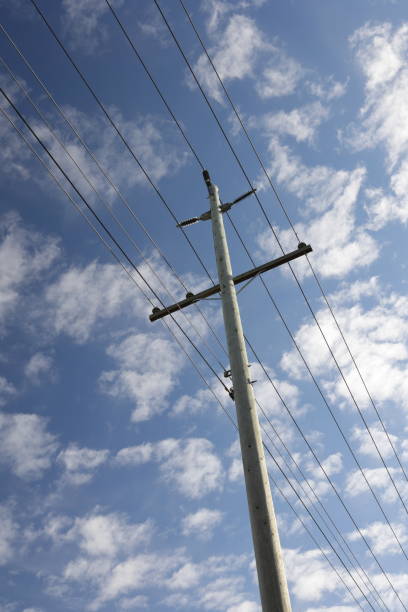 istock Low Angle View of a Utility Pole and Cloudy Sky over Canada 1383990052