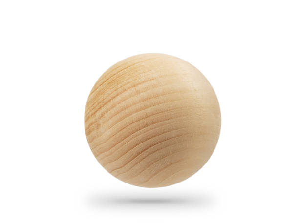 istock balls carved from natural wood, isolated on a white background 1383991496