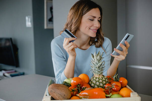 istock Ordering groceries online and paying contactless 1383994008