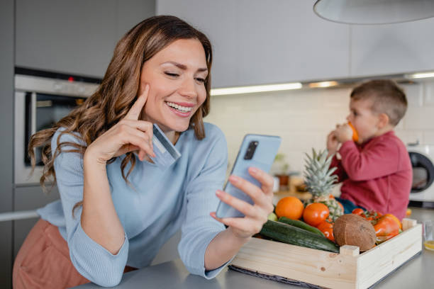 istock Mother orders groceries online 1383994525