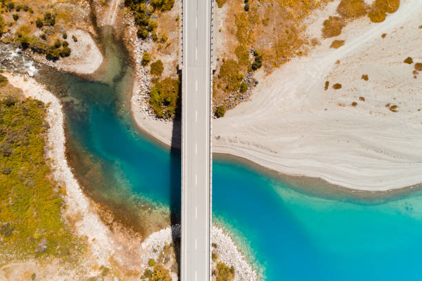 istock High angle view of overpass road on lake. 1384032701