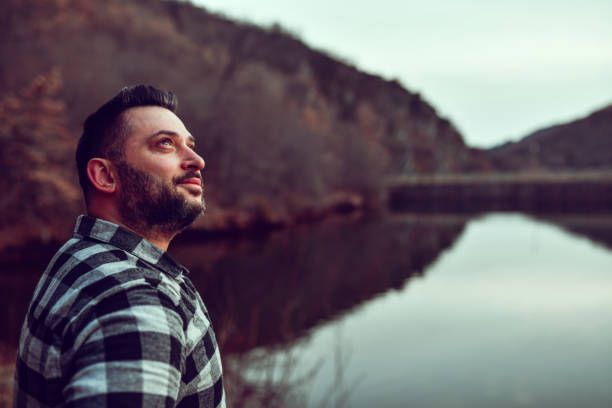 istock Bearded Male Daydreaming About Better Future For Planet Earth 1384038833