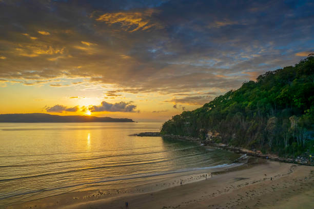 istock Aerial sunrise seascape with  low clouds 1384052476
