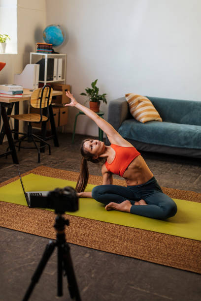 istock Filming yoga session 1384057823