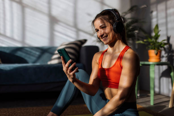 istock Enjoying tunes on phone 1384057982