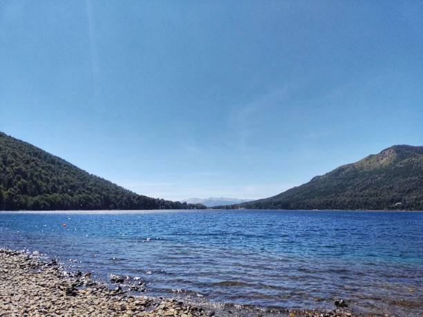 istock Day at the lake with montains 1384058280
