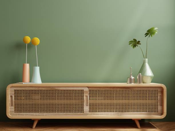 istock Simple minimal cabinet for tv interior green wall mockup. 1384064122