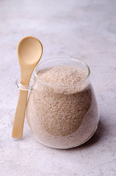 istock Brown psyllium in a glass jar 1384103750