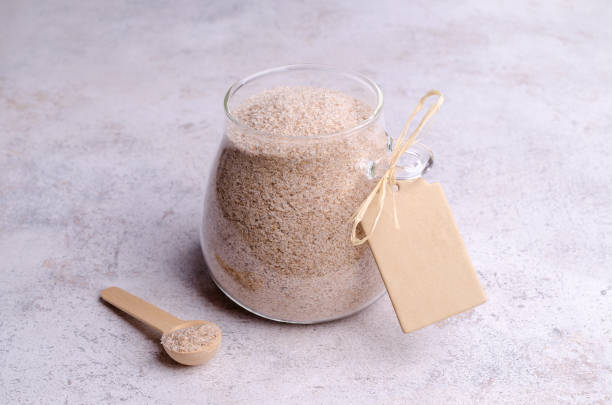 istock Brown psyllium in a glass jar 1384103783