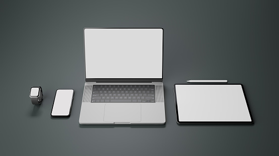 Modern electronic devices mockup on grey background. Laptop computer, smartphone, tablet touchpad, smart watch, and stylus pen white screen mockup. 3d rendering, 3d illustration