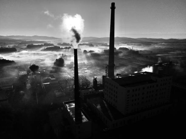 Power plant and the city at sunrise moment in north China stock photo