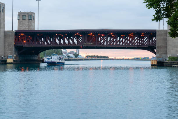 istock Lake Shore Drive bridge in silhouette across Chicago River 1384112101