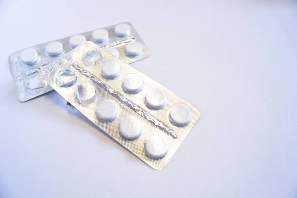 istock White tablets packed in silver blister. indoors 1384116152