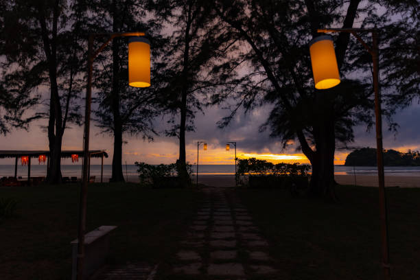 istock sunset on the beach in holiday 1384126316