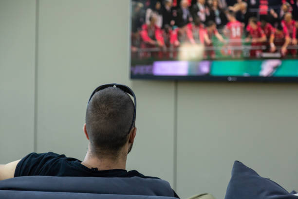 istock The game is on TV 1384129069