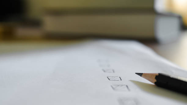 istock Black marking on checklist box with pencil close up. Checklist concept 1384144723