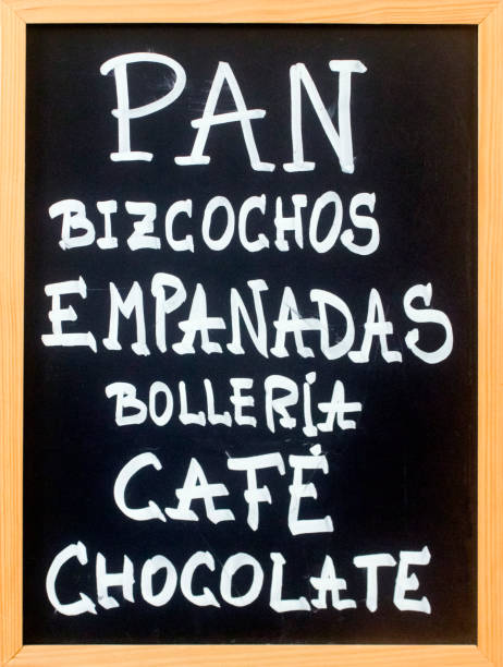 istock Cafeteria, bakery menu handwritten with chalk on blackboard. 1384148322