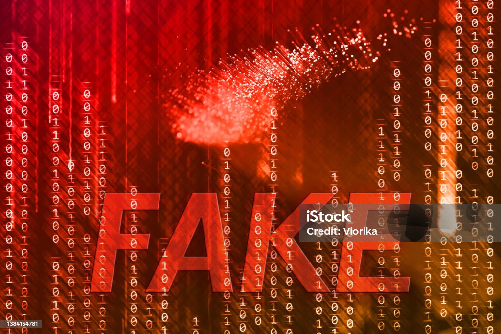 Fake on a binary code background Binary code abstract background with "Fake" text. Misinformation Stock Photo