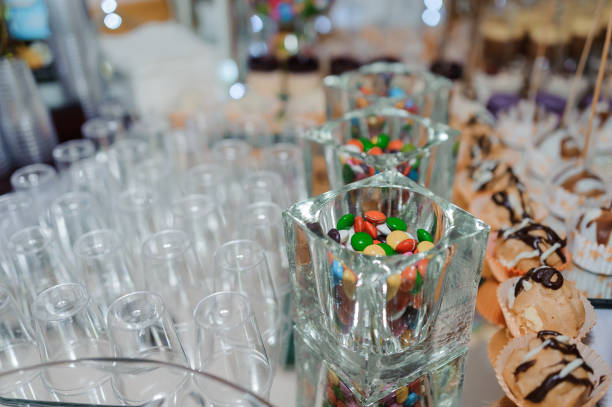 istock Sweet cakes in cups at a wedding buffet. Candy bar catering 1384155915