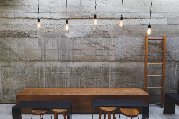istock cafe interior Layout in a loft style in dark colors open space interior view of various coffee Welcome open coffee shop background 1384159889