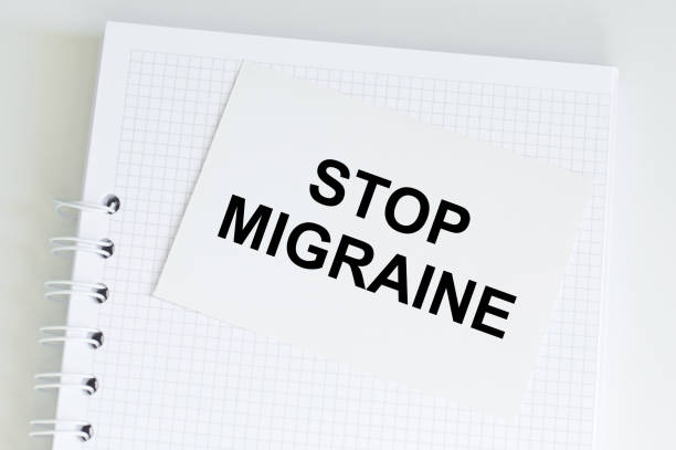 istock Text on a card Stop Migraine, medical concept. 1384183415