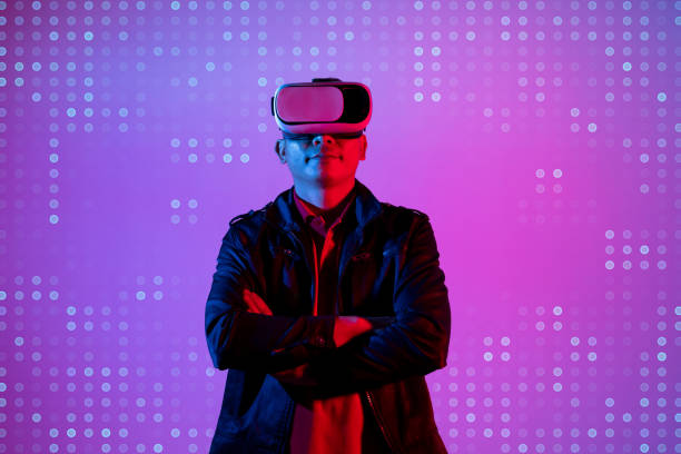 istock Metaverse digital cyber world technology, man with virtual reality VR goggle playing AR augmented reality game and entertainment 1384183423