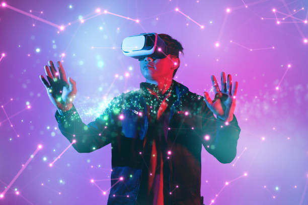 istock Metaverse digital cyber world technology, man with virtual reality VR goggle playing AR augmented reality game and entertainment 1384183424