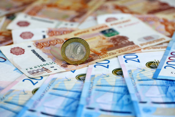 istock Russian rubles, coin and paper currency 1384197158