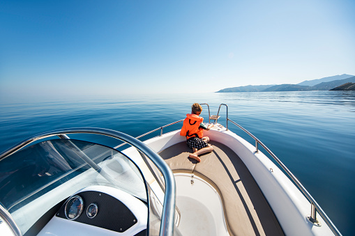 Father and son at speedboat