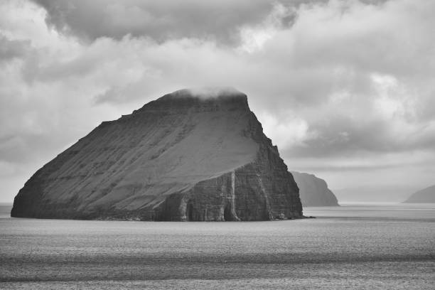 istock Faroe islands cloudy landscape and atlantic ocean. Vagar 1384205325