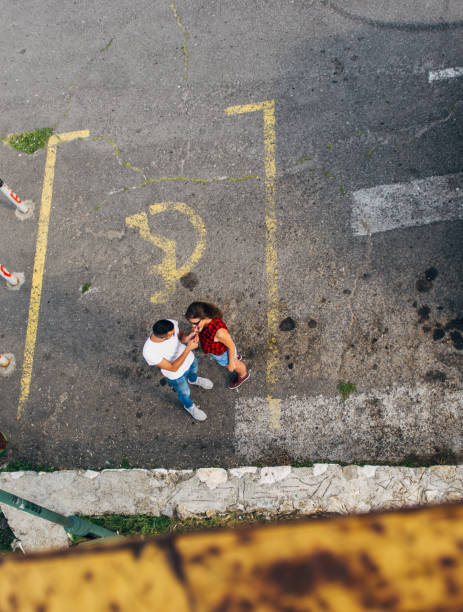 istock View to two people from high metal board 1384213499
