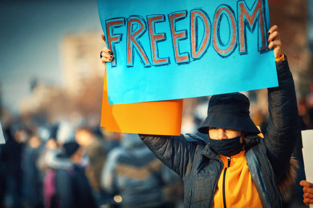 istock Protestor in the street. 1384216945