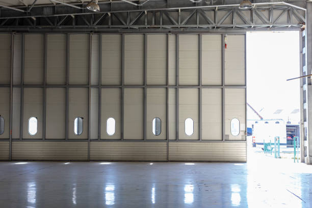 istock View of Empty  Hangar with the Door 1384217495