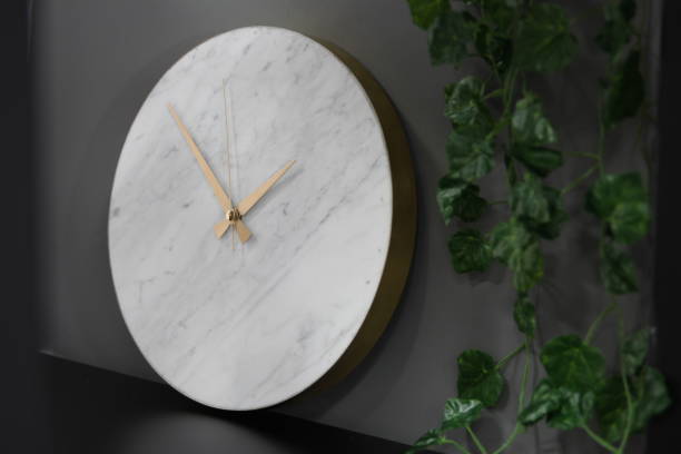 istock modern marble clock. dark contrast photo. 1384218345