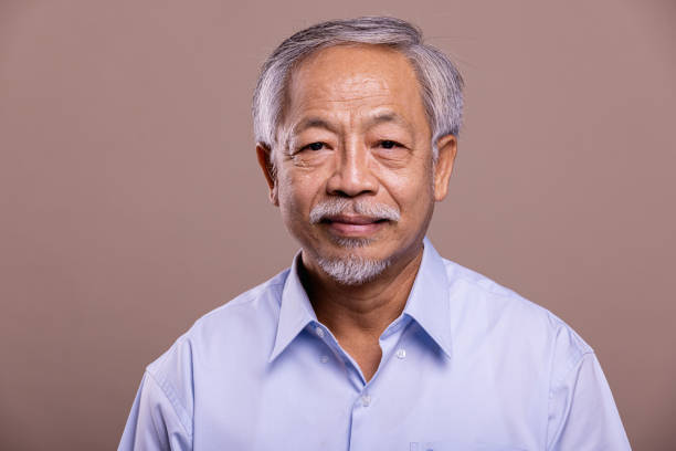 istock Senior man portrait. 1384219046