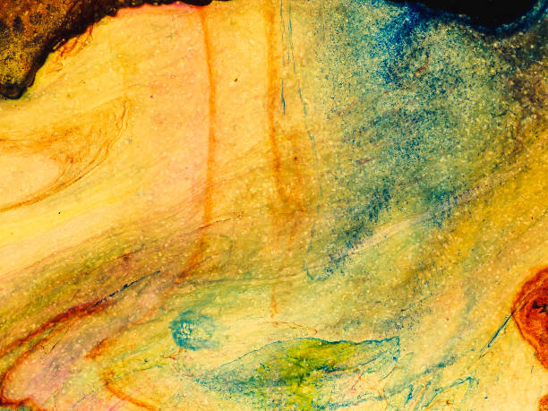 istock Abstract painting linear elements forming a wavy shape with undulating elements. shades of golden yellow green blue pink. 1384219377